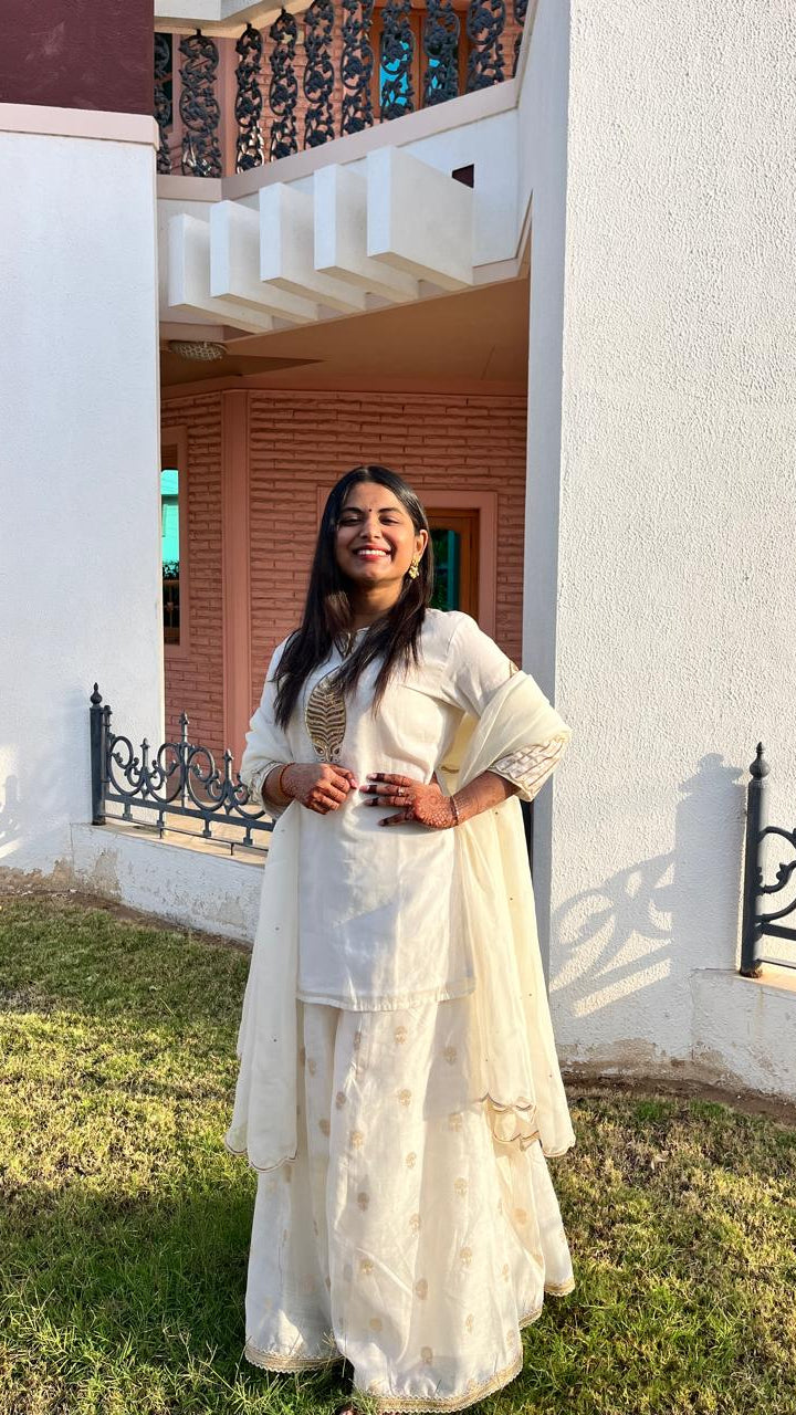 Vrunda's Ivory Short Kurta and Sharara Set