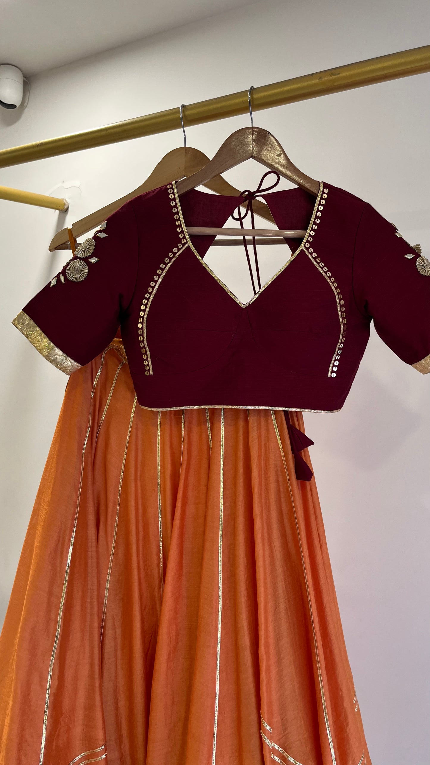 Orange Gota lehenga with Maroon Blouse