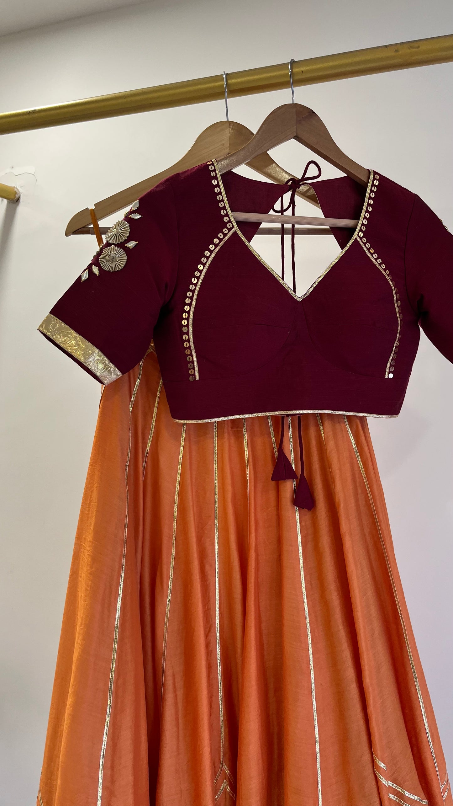 Orange Gota lehenga with Maroon Blouse