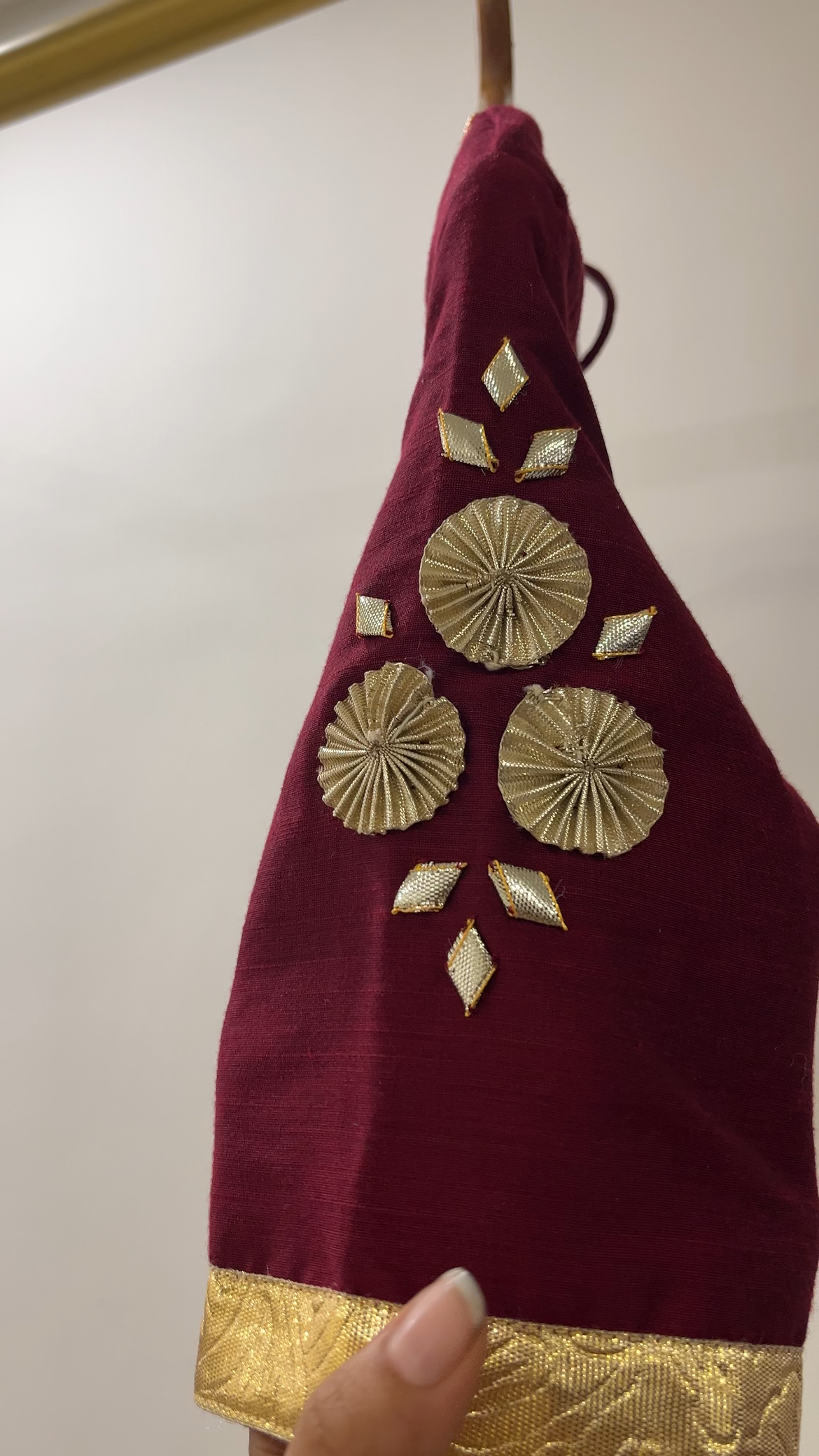 Orange Gota lehenga with Maroon Blouse
