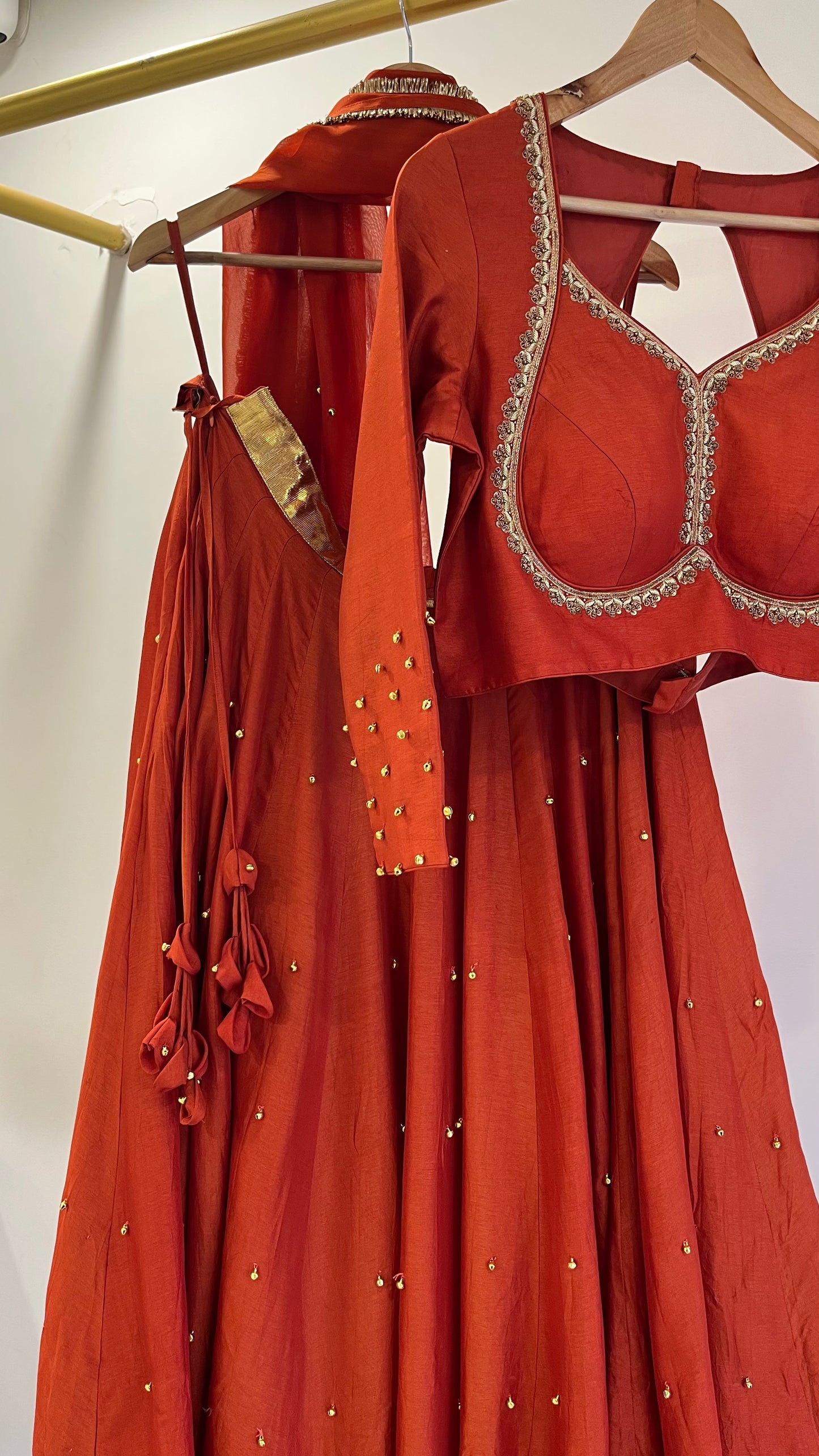 Rust Ghunghroo Lehenga Set